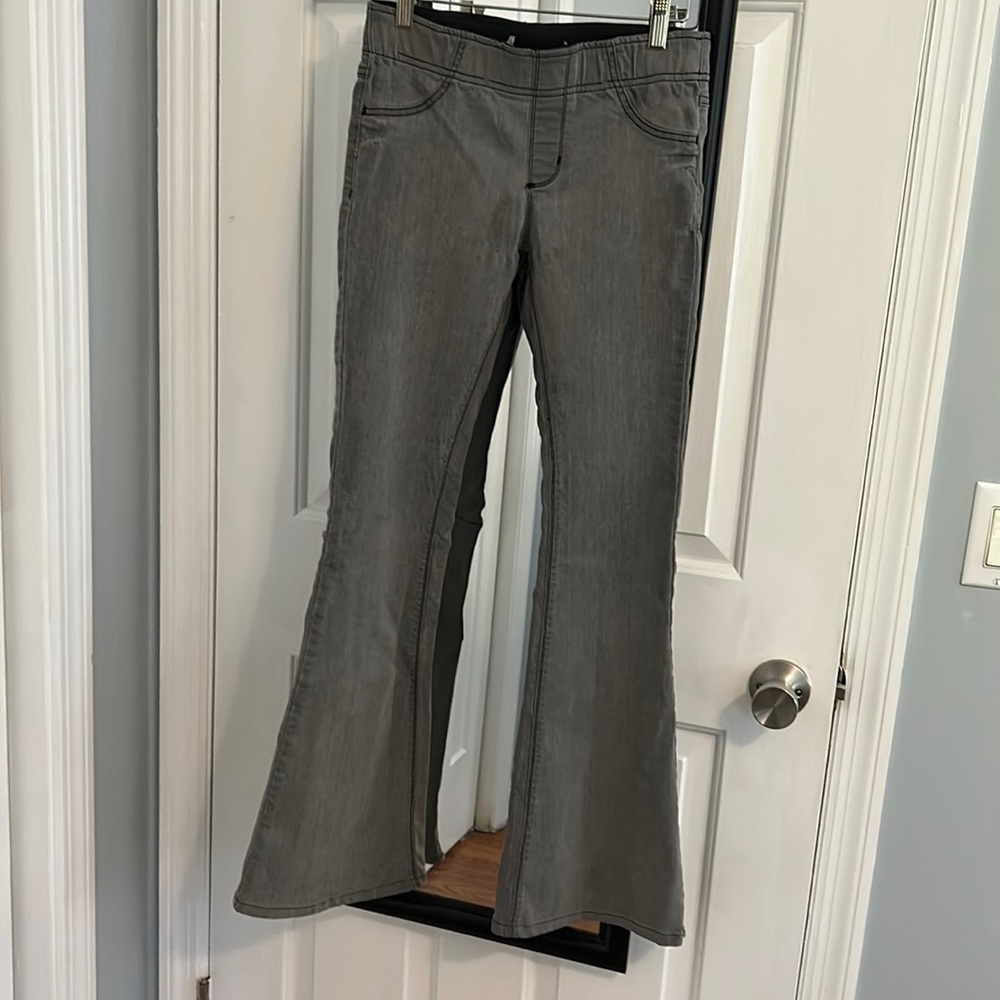 Free people flare Jean. Stretch waist. Size 27 waist. Grey wash.
